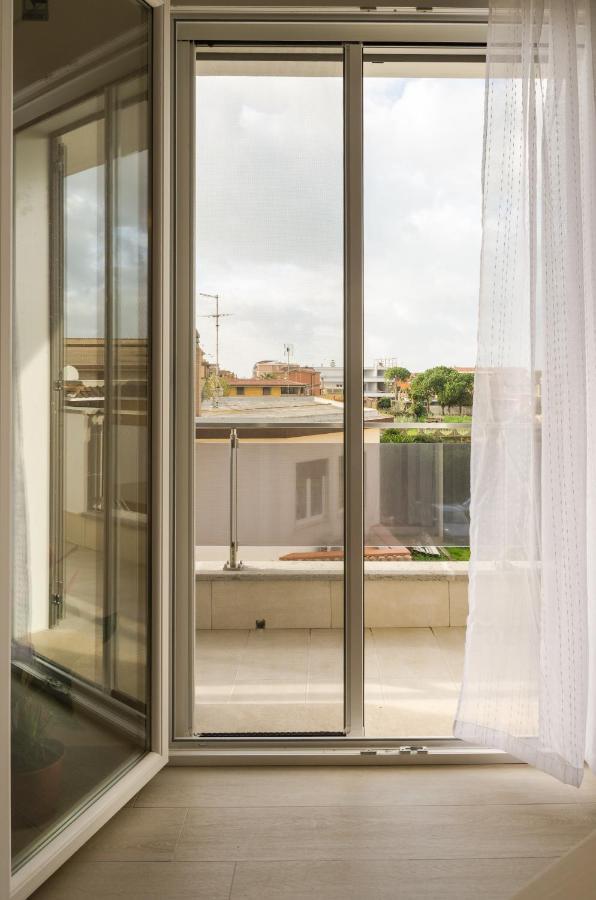 Fco Secrets Luxury Apartment Fiumicino Bagian luar foto